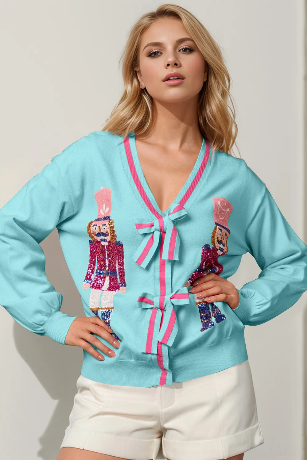 Image of Double Take Full Size Nutcracker Sequin Bow Decor Cardigan | Queeble.shop