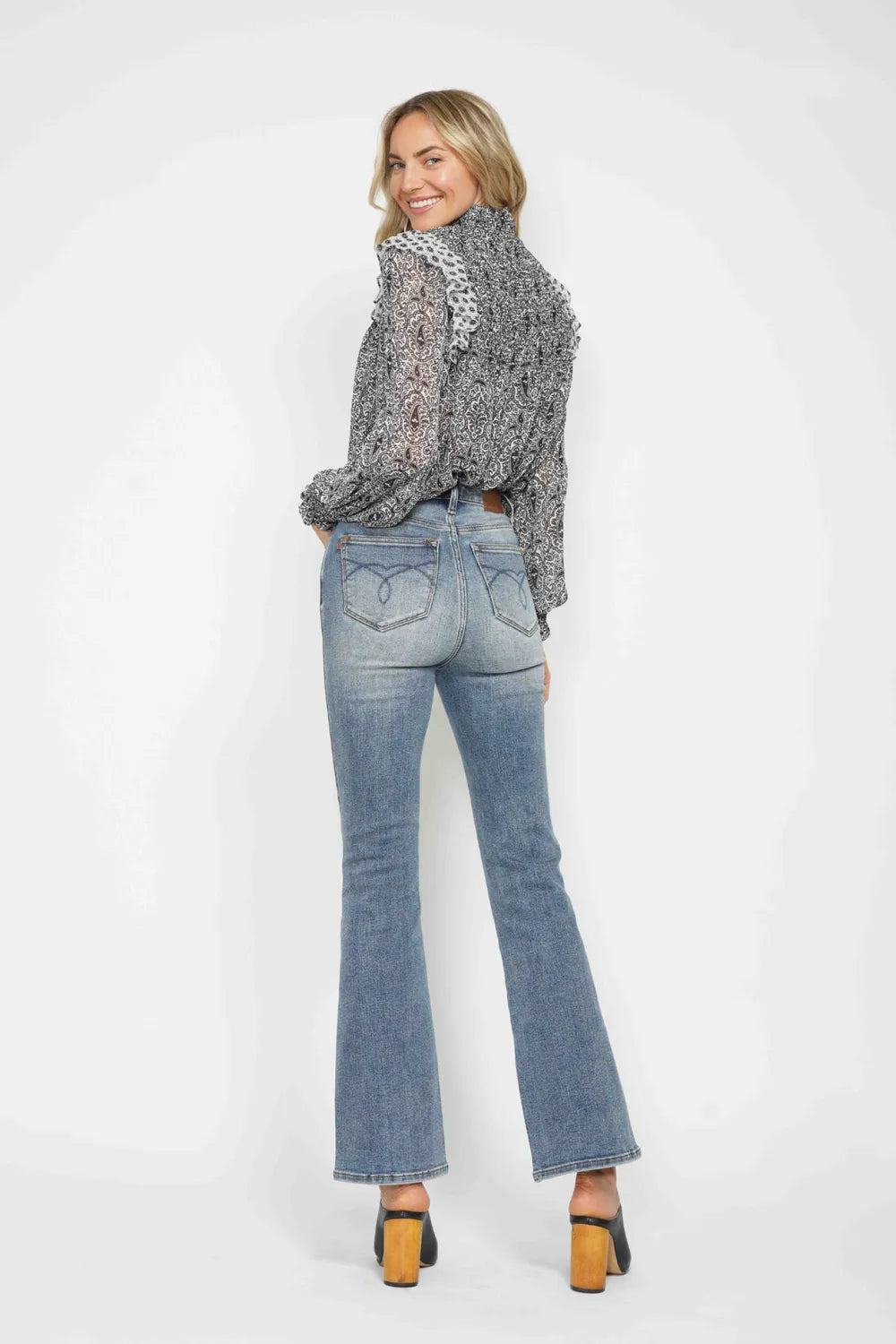 Image of Judy Blue Full Size Tummy Control Back Embroidered Pocketed Bootcut Jeans Plus Size | Queeble.shop