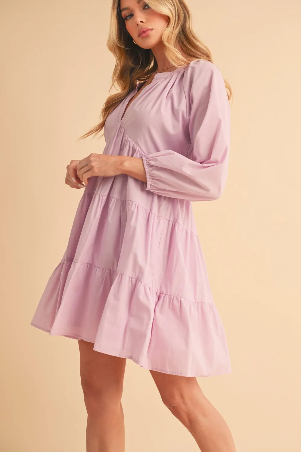 Image of Aemi + Co Notched Balloon Sleeve Tiered Mini Dress | Queeble.shop