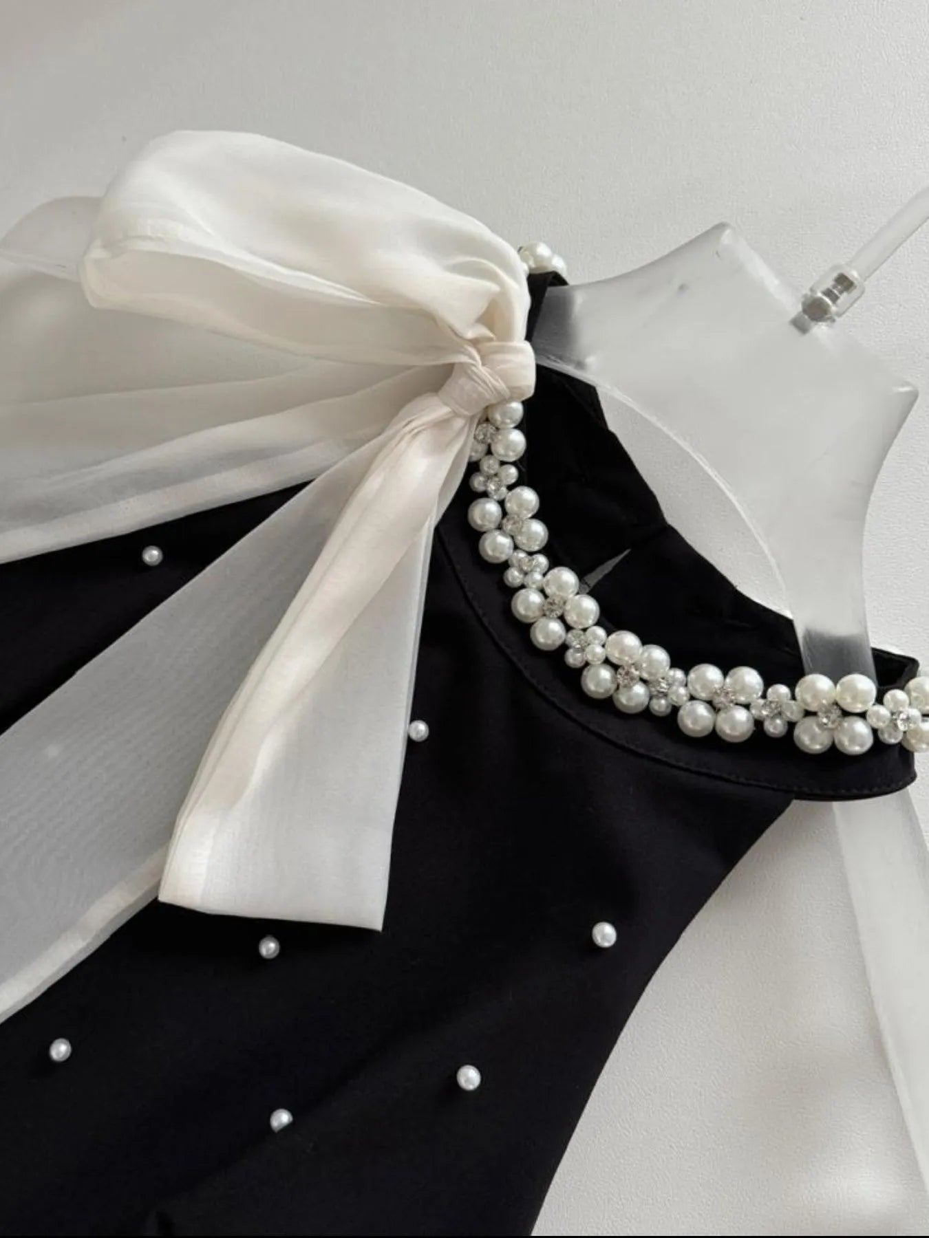 Image of Pearl Detail Sleeveless Mini Dress | Queeble.shop