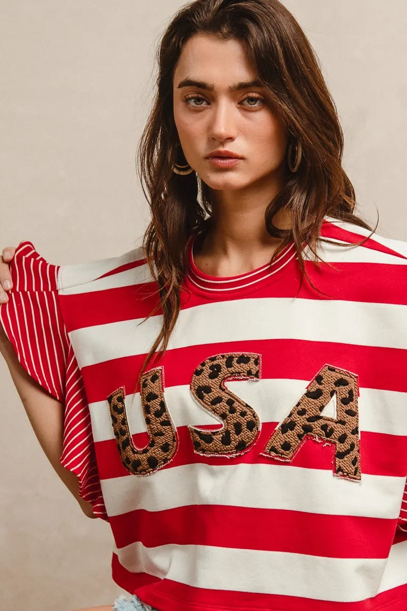 Image of BiBi Stripe Mixed Ruffle Sleeve Top With Leopard Letter | Queeble.shop