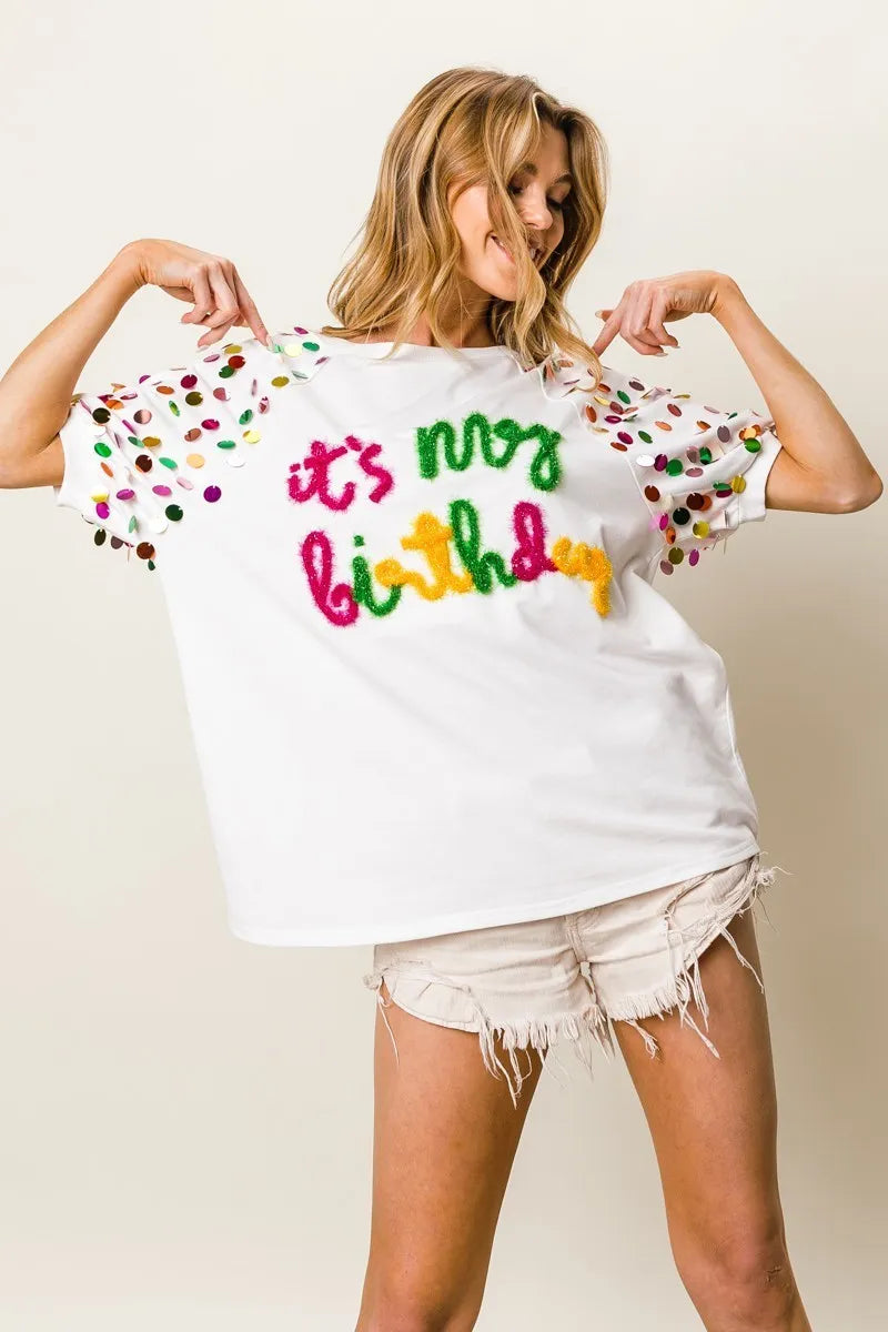 Image of BiBi Metallic Letter Spangle Raglan Puff Sleeve Top | Queeble.shop