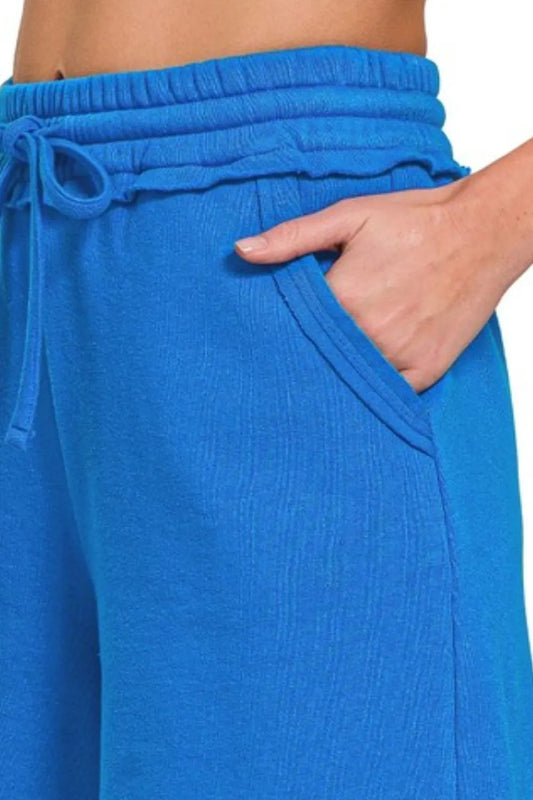 Image of Zenana Fleece Raw Hem Shorts With Draw String | Queeble.shop