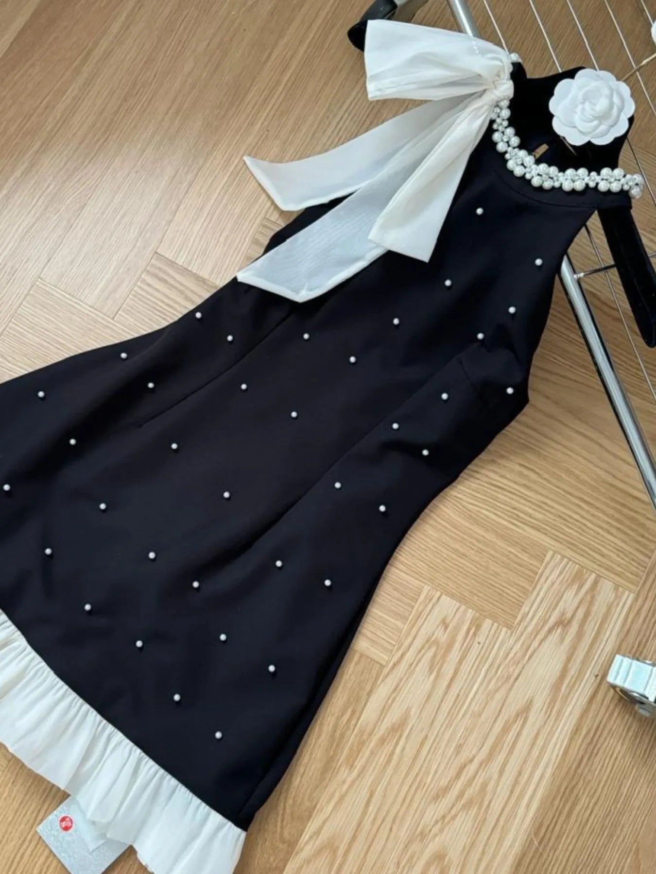 Image of Pearl Detail Sleeveless Mini Dress | Queeble.shop