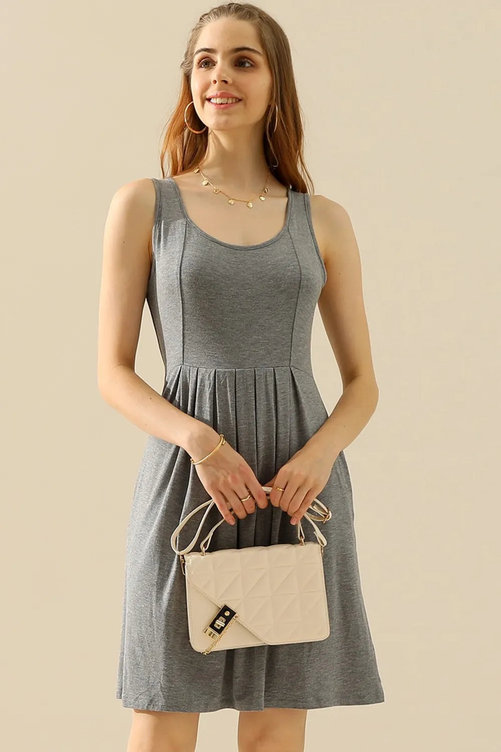 Image of Doublju Full Size Round Neck Ruched Sleeveless Dress with Pockets | Queeble.shop