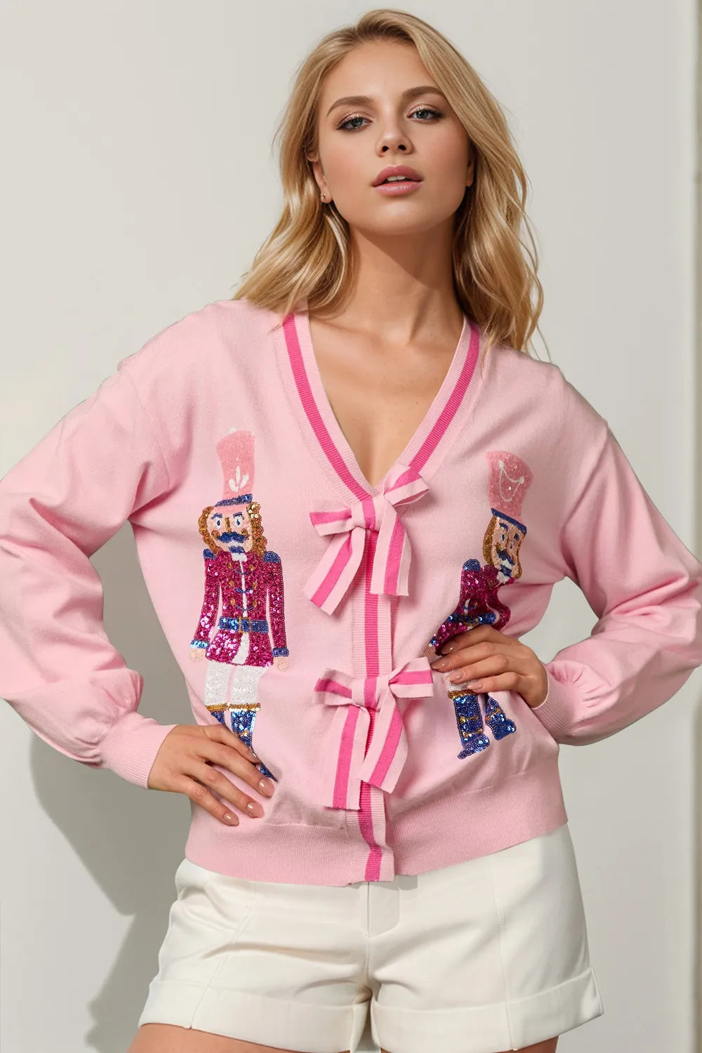 Image of Double Take Full Size Nutcracker Sequin Bow Decor Cardigan | Queeble.shop