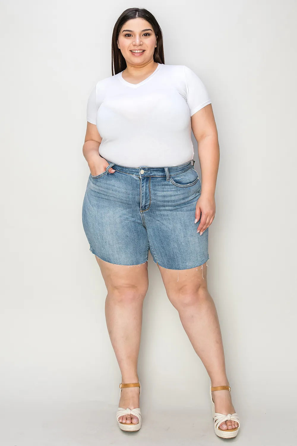 Image of Judy Blue Full Size High Waist Raw Hem Denim Shorts | Queeble.shop