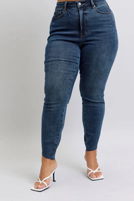 Image of Judy Blue Full Size High Waist Tummy Control Step Hem Skinny Jeans Plus Size | Queeble.shop