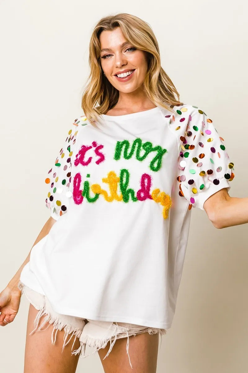 Image of BiBi Metallic Letter Spangle Raglan Puff Sleeve Top | Queeble.shop