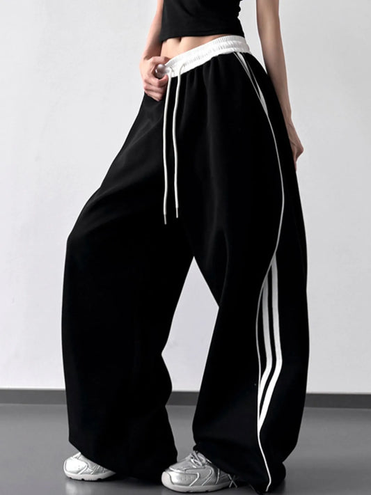 Image of Oversized Streetwear Pants with Side Stripes | Queeble.shop