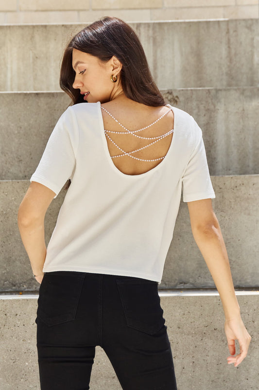 Image of And The Why Pearly White Full Size Criss Cross Pearl Detail Open Back T-Shirt | Queeble.shop