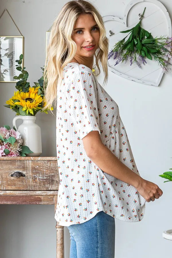 Image of Heimish Full Size Crisscross Ditsy Floral Babydoll Top Plus Size | Queeble.shop