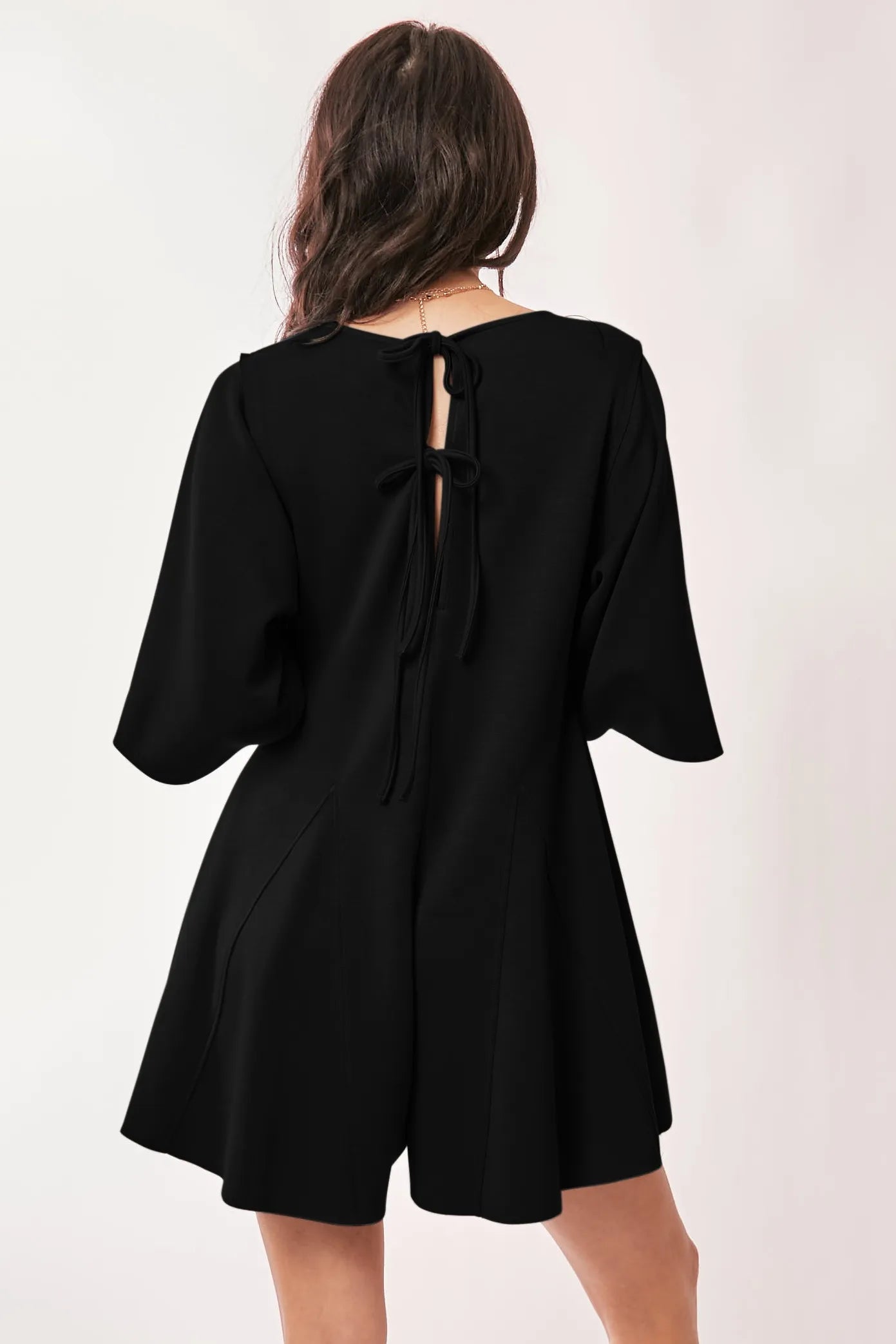 Image of Davi & Dani Solid Draped Sleeve Ties Back Skort Romper | Queeble.shop