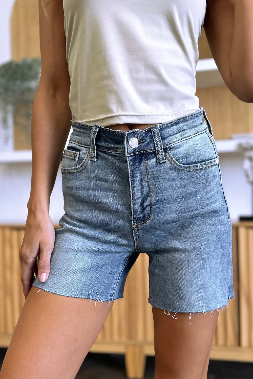 Image of Judy Blue Full Size High Waist Raw Hem Denim Shorts | Queeble.shop