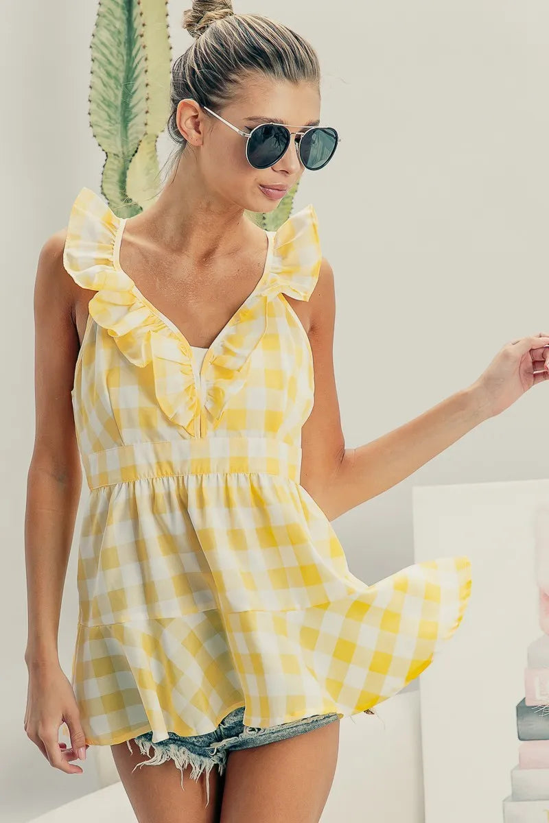 Image of BiBi Ruffled Neckline Sleeveless Check Plaid Peplum Top | Queeble.shop