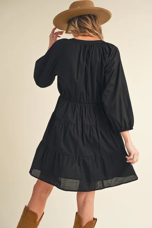 Image of Aemi + Co Notched Balloon Sleeve Tiered Mini Dress | Queeble.shop