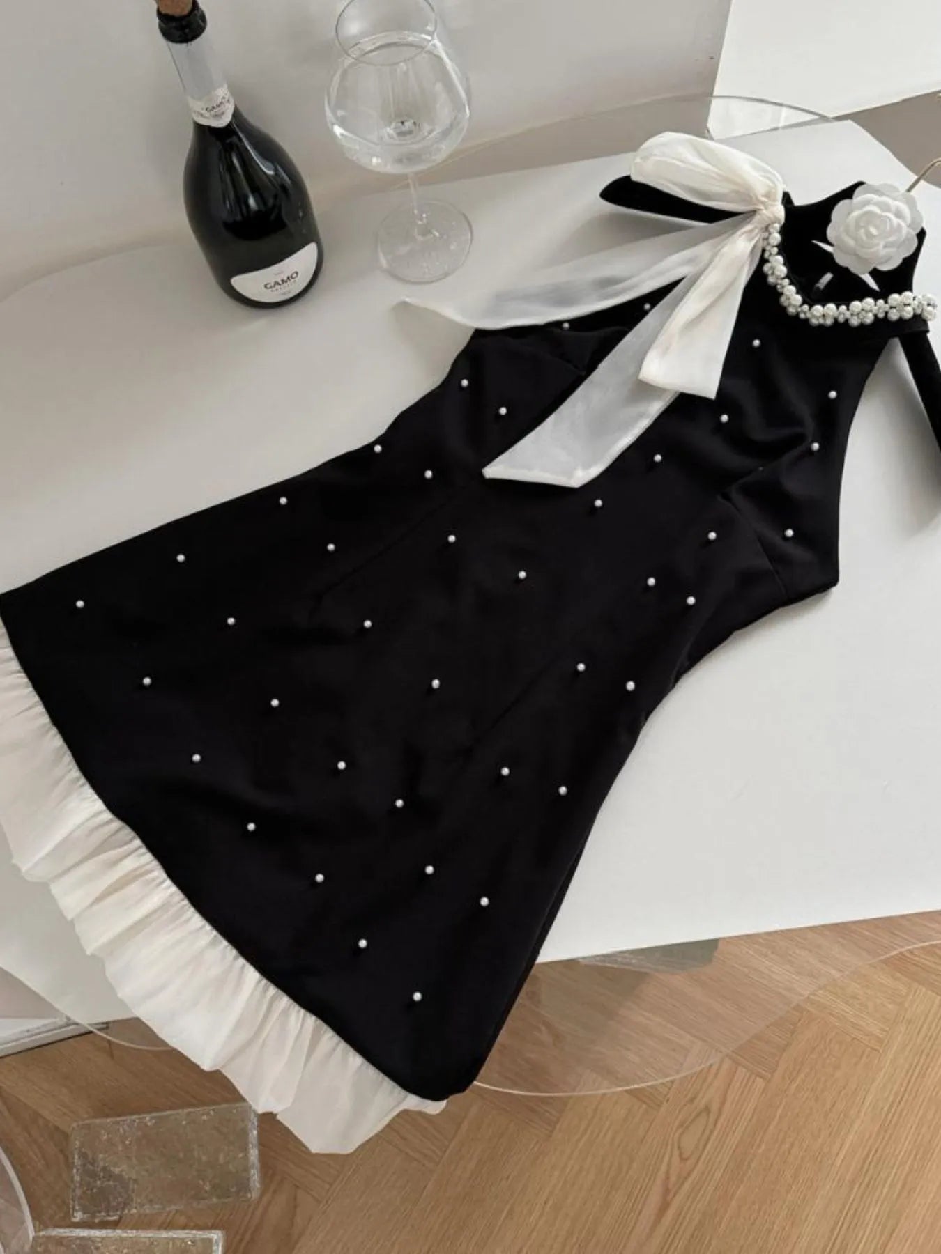 Image of Pearl Detail Sleeveless Mini Dress | Queeble.shop