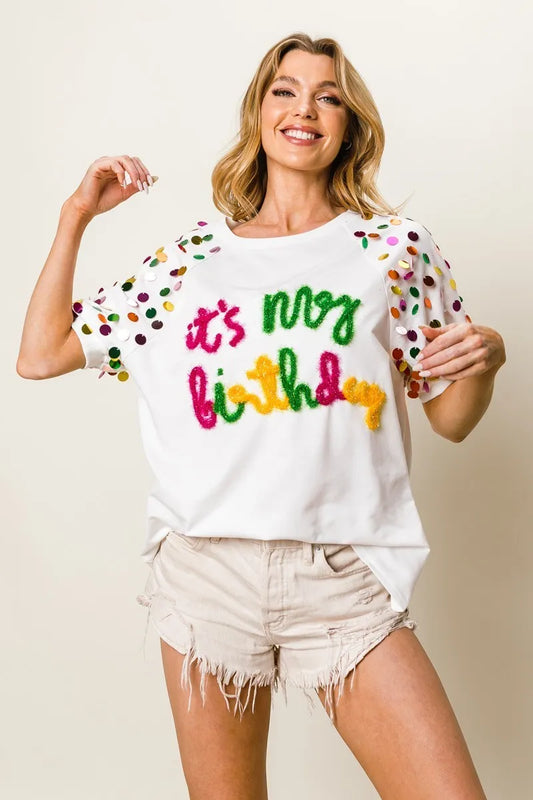 Image of BiBi Metallic Letter Spangle Raglan Puff Sleeve Top | Queeble.shop