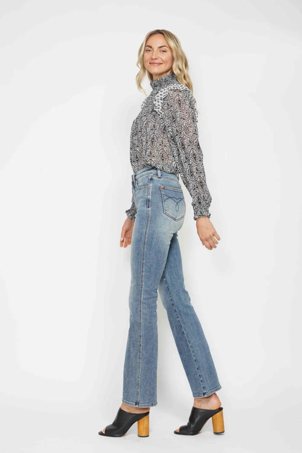 Image of Judy Blue Full Size Tummy Control Back Embroidered Pocketed Bootcut Jeans Plus Size | Queeble.shop