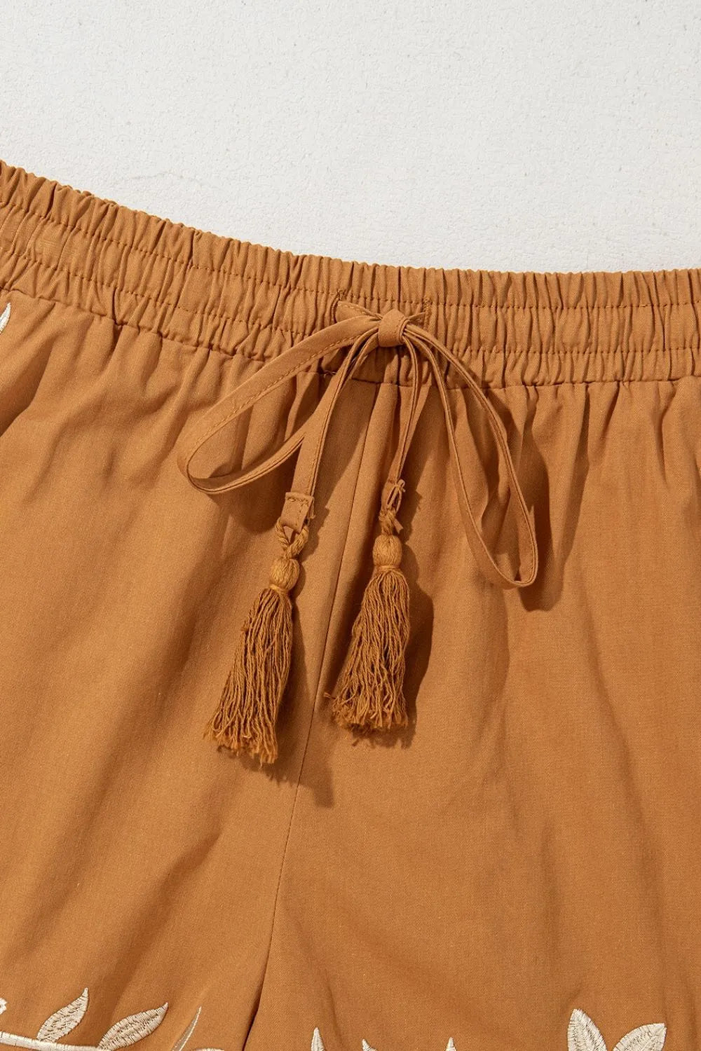 Image of Embroidered Boho Tasseled Drawstring Elastic Waist Casual Shorts | Queeble.shop