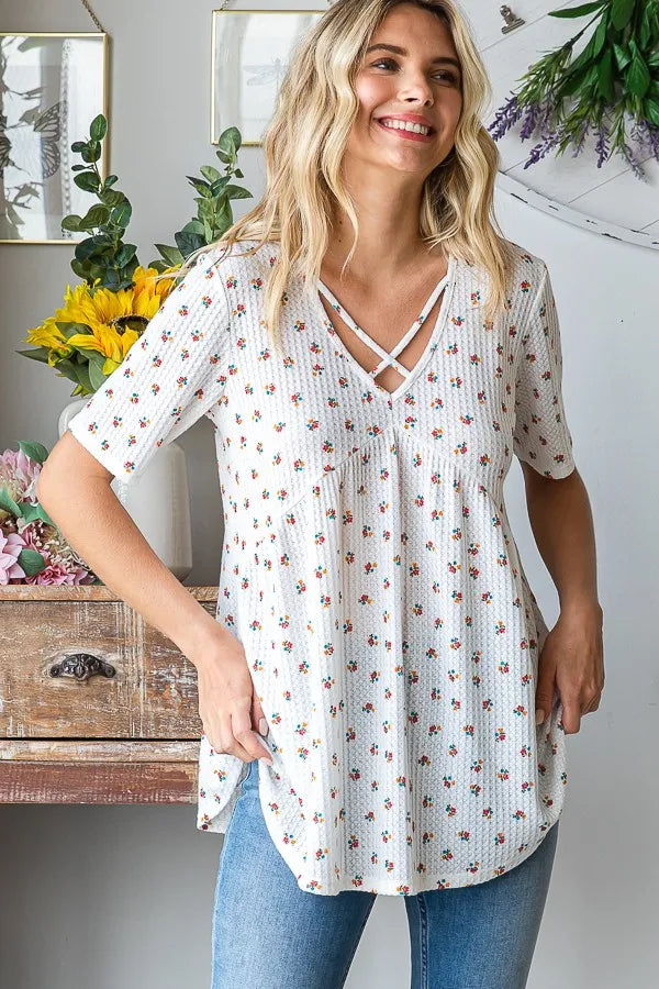 Image of Heimish Full Size Crisscross Ditsy Floral Babydoll Top Plus Size | Queeble.shop
