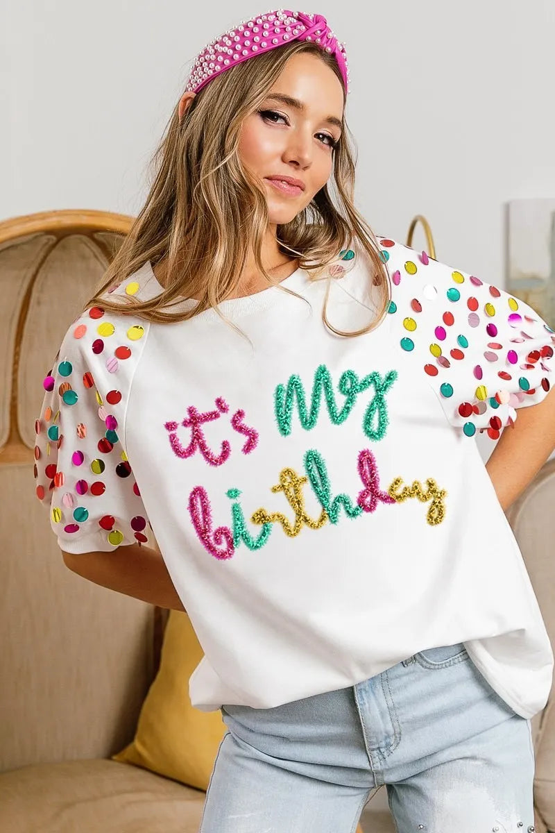 Image of BiBi Metallic Letter Spangle Raglan Puff Sleeve Top | Queeble.shop