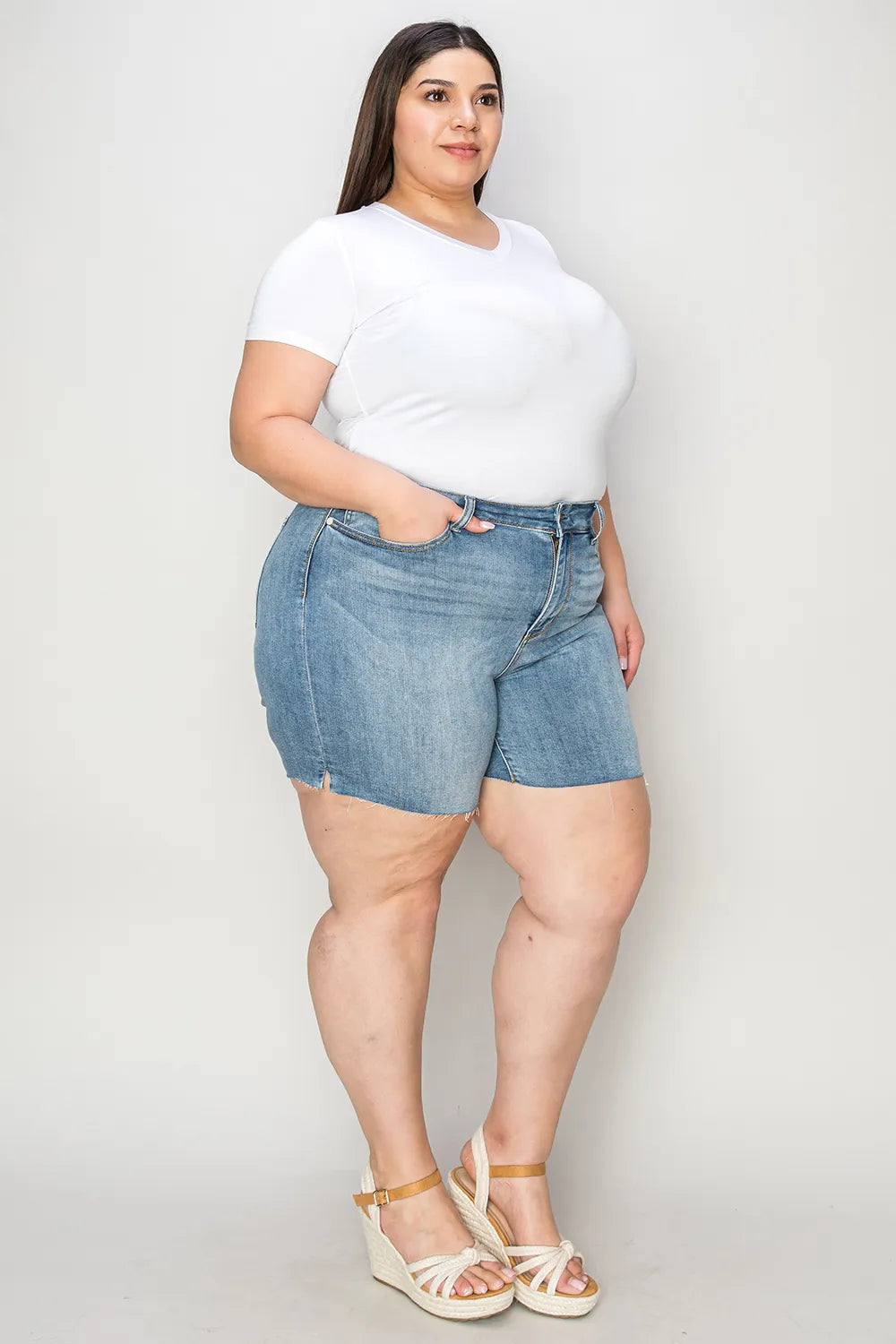 Image of Judy Blue Full Size High Waist Raw Hem Denim Shorts | Queeble.shop