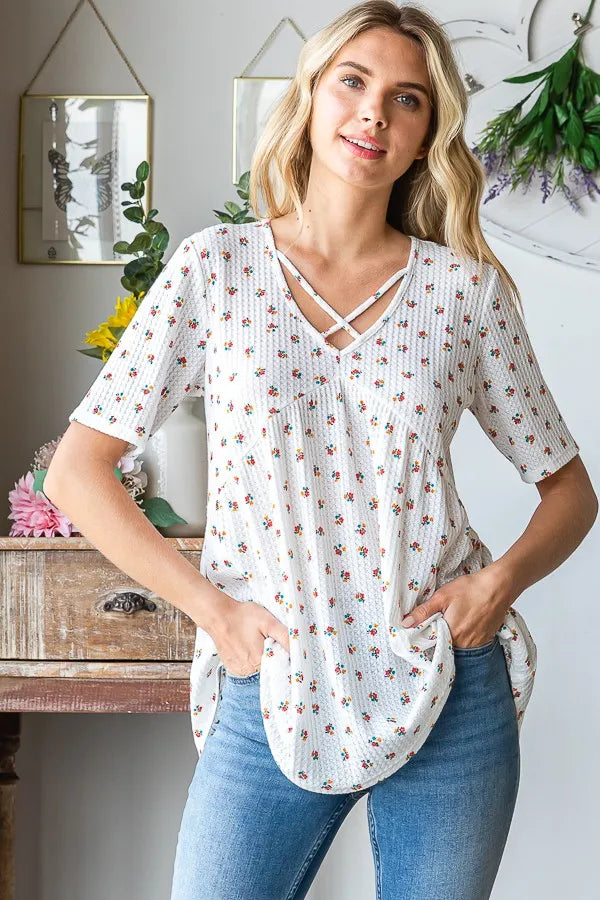 Image of Heimish Full Size Crisscross Ditsy Floral Babydoll Top Plus Size | Queeble.shop