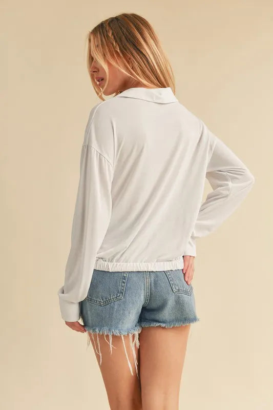 Image of Aemi + Co Twisted Hemline Button Detail Collared Neck Top | Queeble.shop