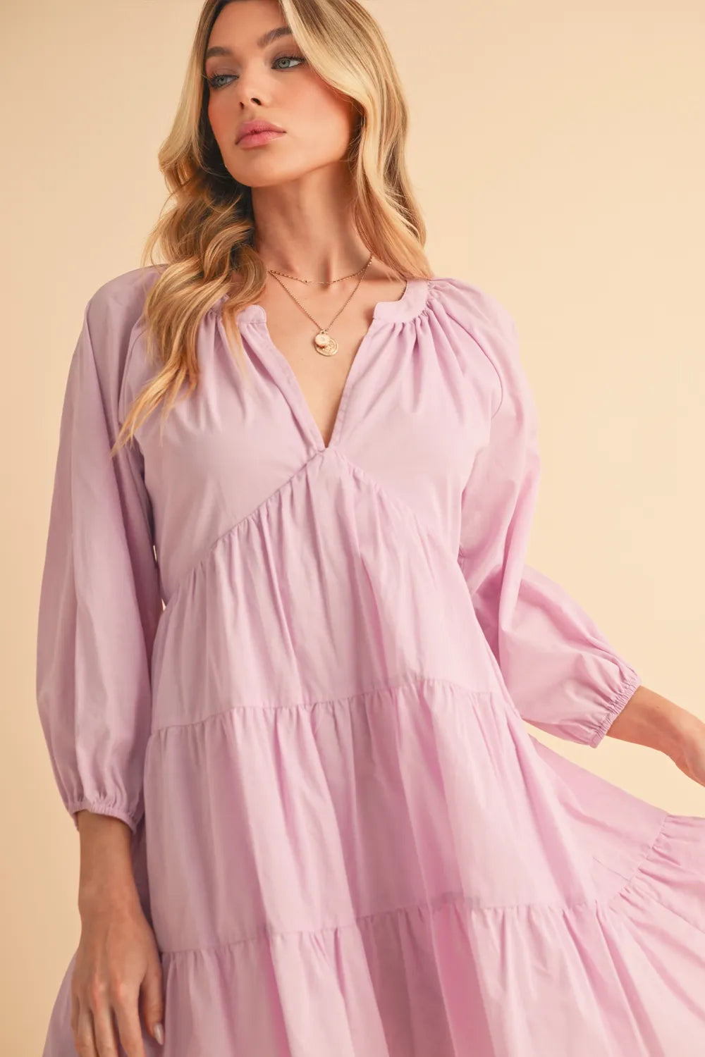 Image of Aemi + Co Notched Balloon Sleeve Tiered Mini Dress | Queeble.shop