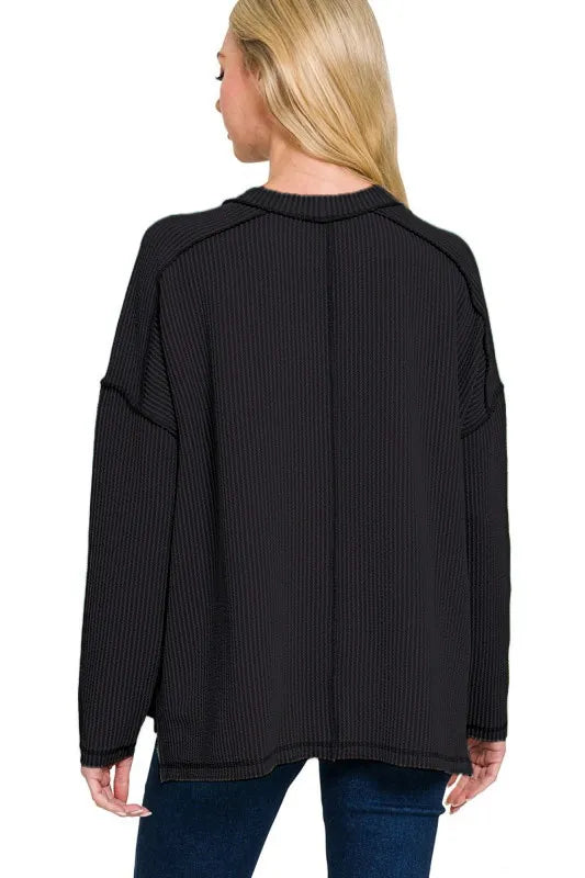 Image of Zenana Full Size Exposed Seam Long Sleeve Corded Rib Knit Top Plus Size | Queeble.shop