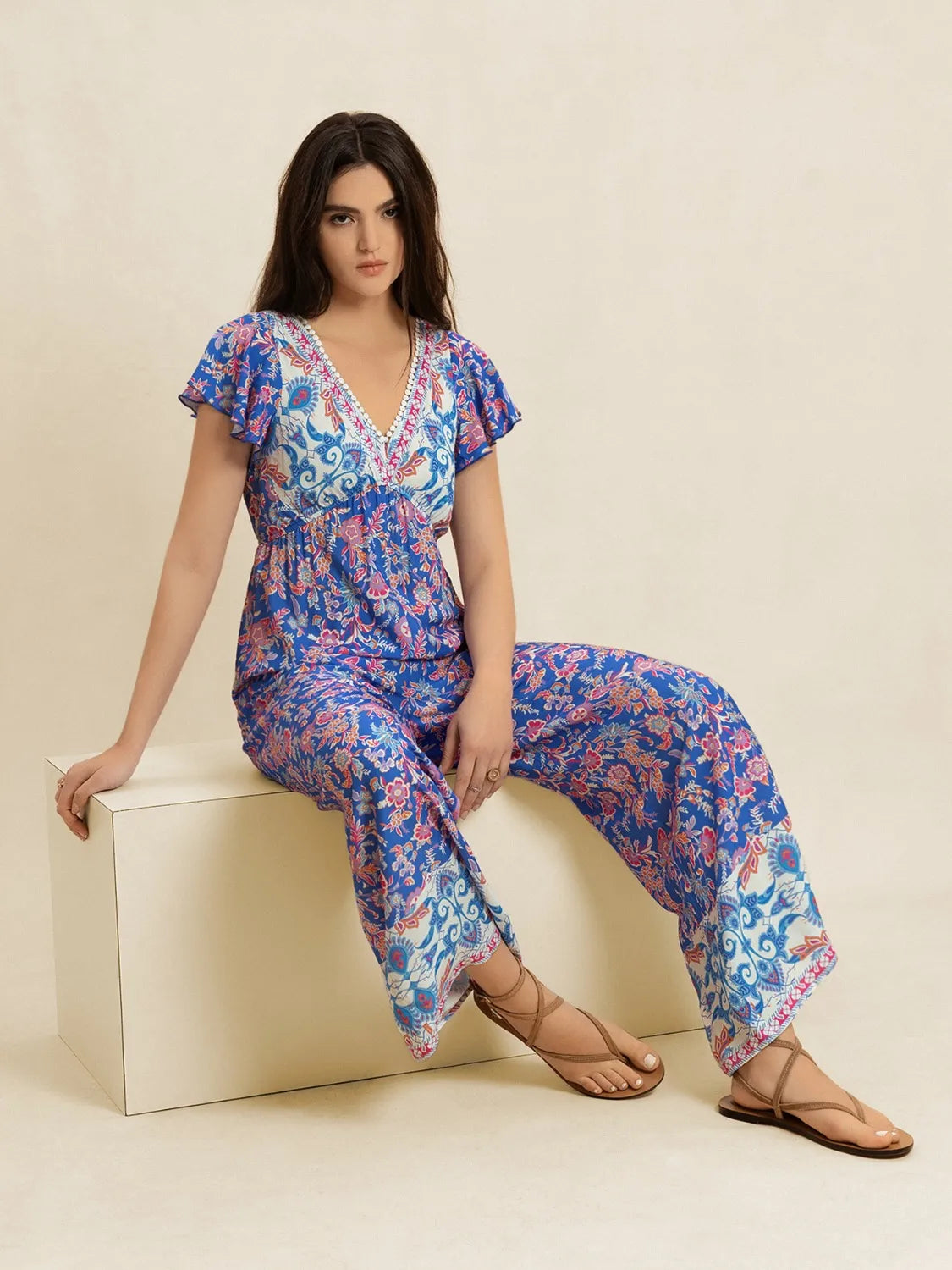 Image of Printed V-Neck Wide Leg Jumpsuit | Queeble.shop