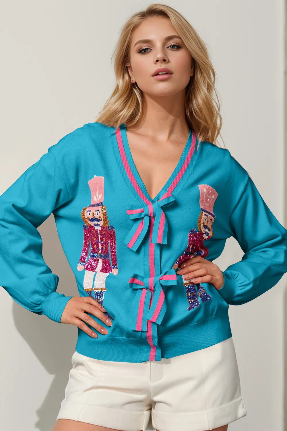 Image of Double Take Full Size Nutcracker Sequin Bow Decor Cardigan | Queeble.shop