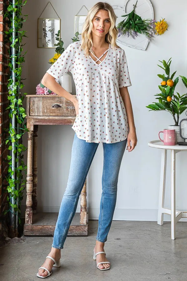 Image of Heimish Full Size Crisscross Ditsy Floral Babydoll Top Plus Size | Queeble.shop
