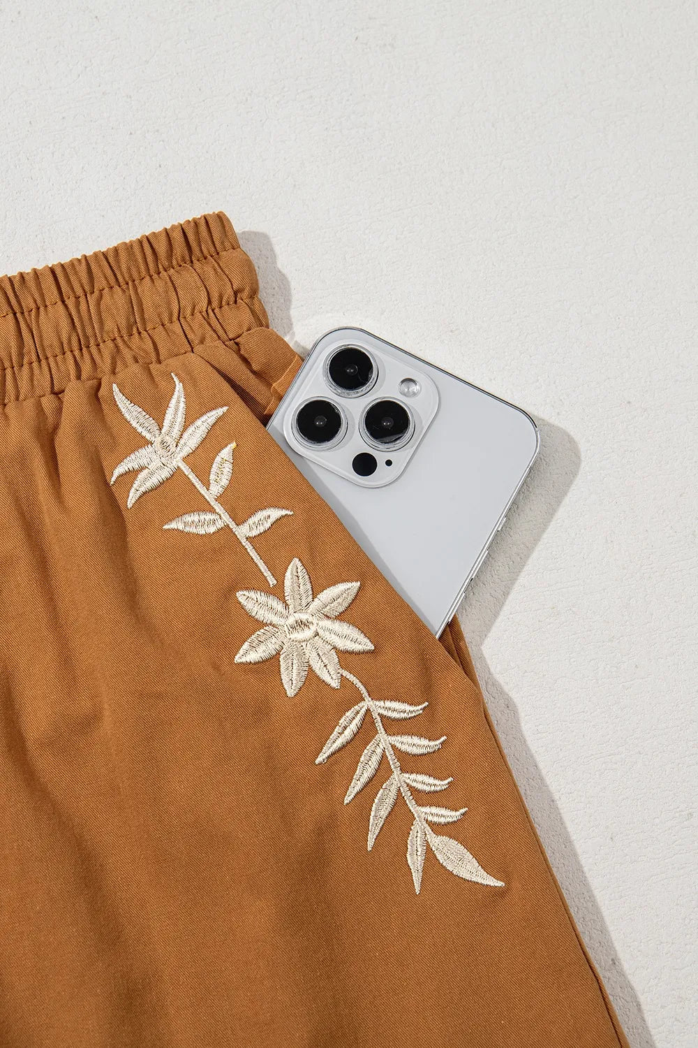 Image of Embroidered Boho Tasseled Drawstring Elastic Waist Casual Shorts | Queeble.shop