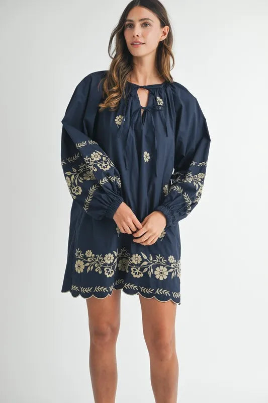 Image of MABLE Embroidered Long Sleeve Peasant Mini Dress | Queeble.shop