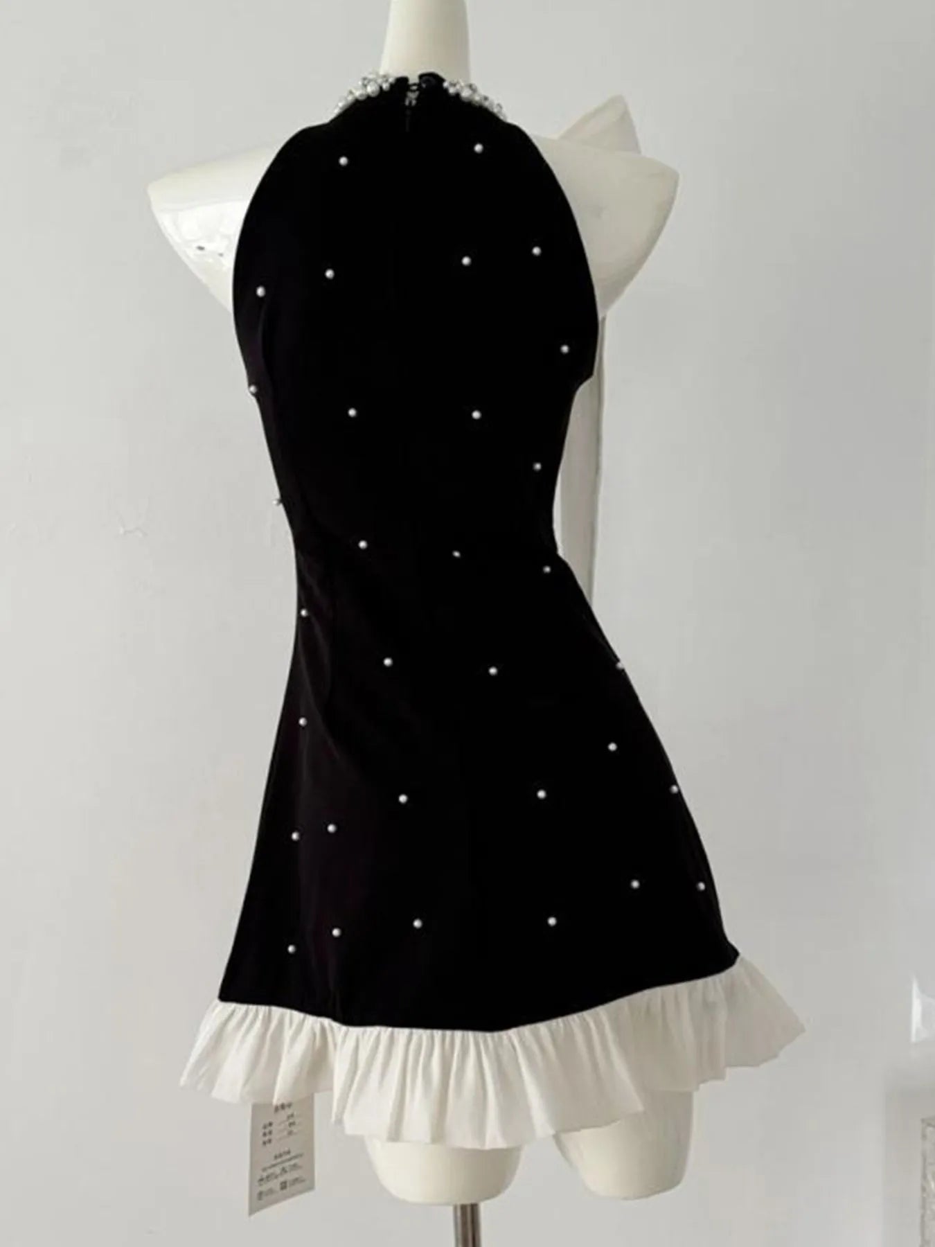 Image of Pearl Detail Sleeveless Mini Dress | Queeble.shop