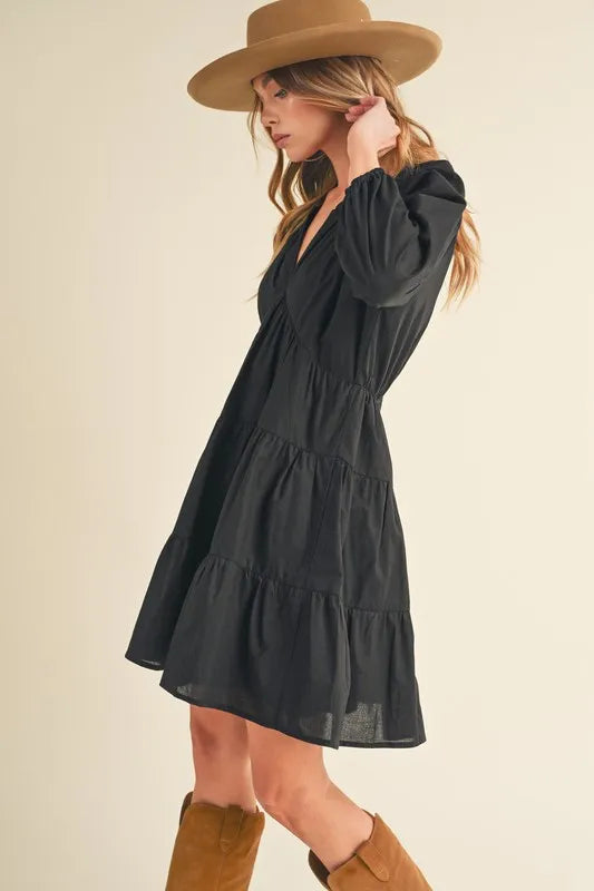 Image of Aemi + Co Notched Balloon Sleeve Tiered Mini Dress | Queeble.shop