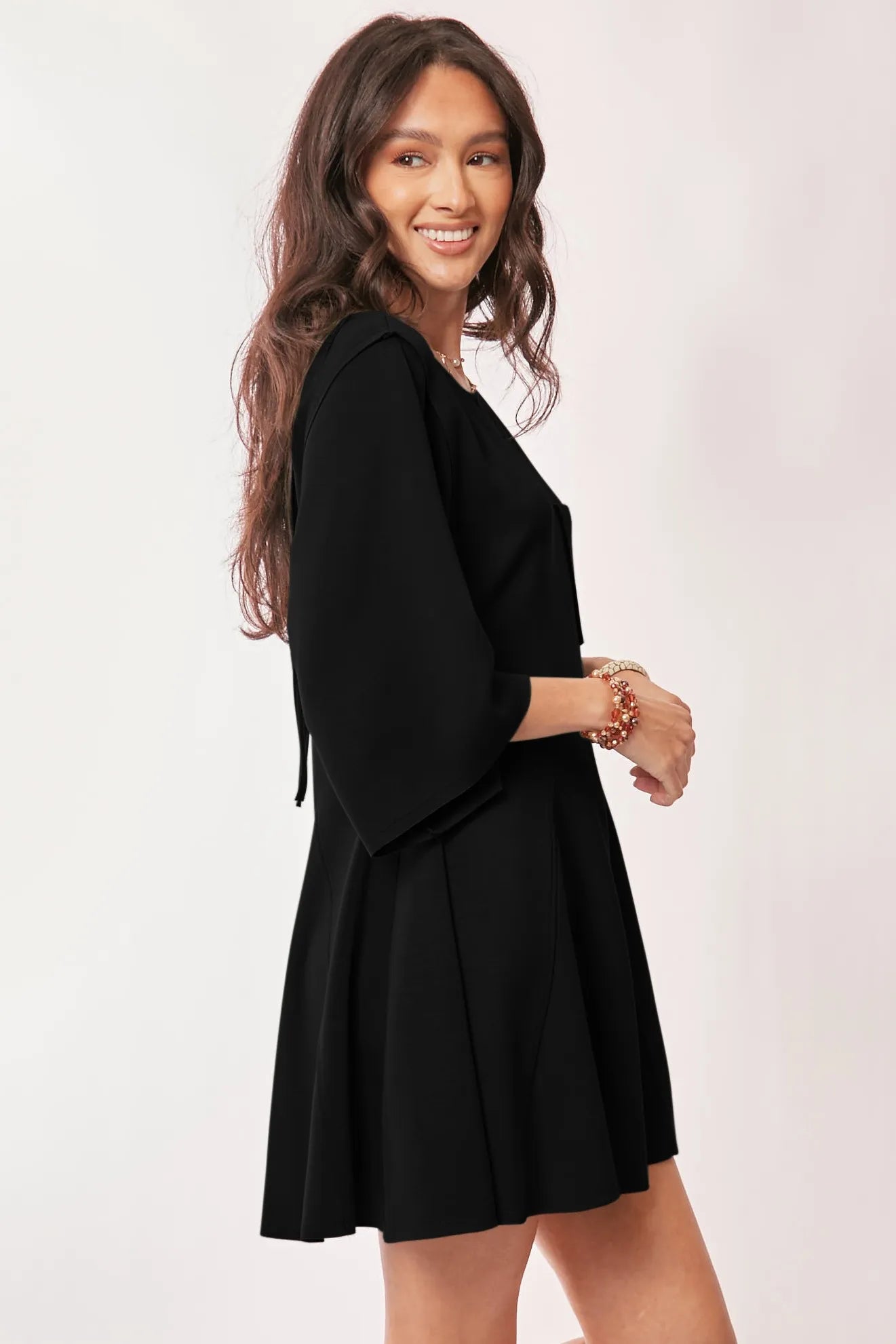 Image of Davi & Dani Solid Draped Sleeve Ties Back Skort Romper | Queeble.shop