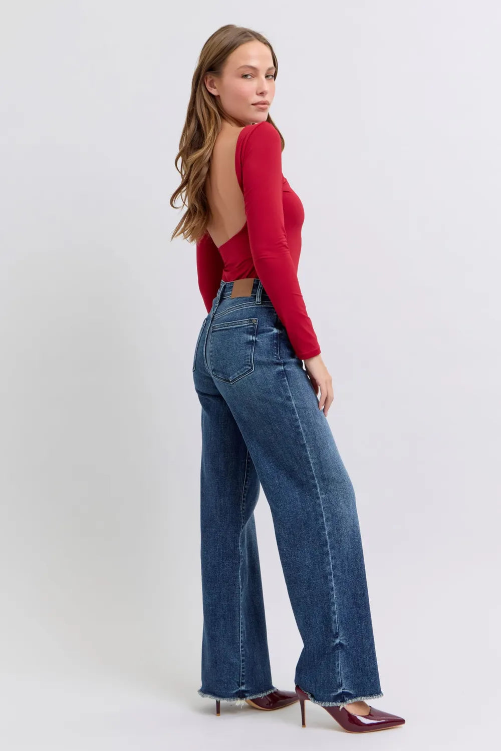 Image of Judy Blue Full Size Raw Hem Mid Rise Jeans | Queeble.shop