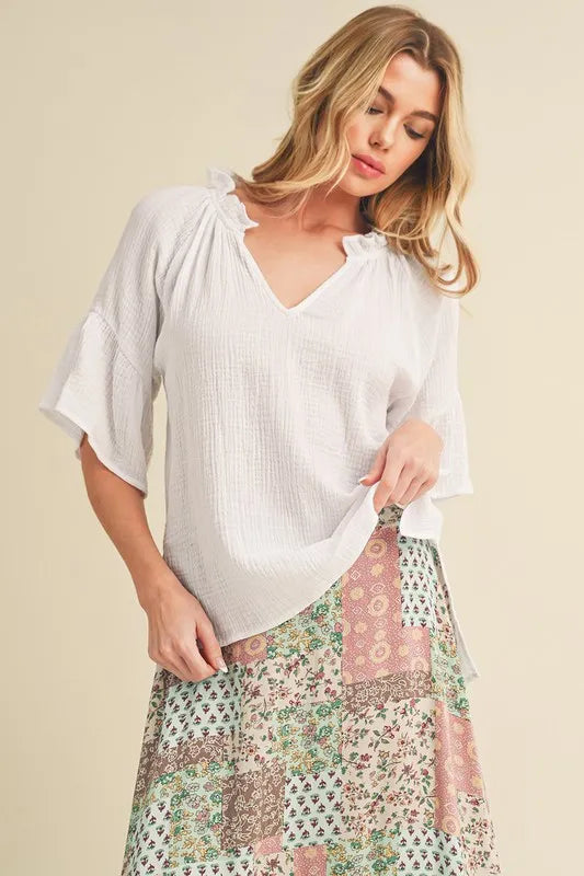 Image of Aemi + Co Side Slit Notched Ruffled Half Sleeve Blouse | Queeble.shop