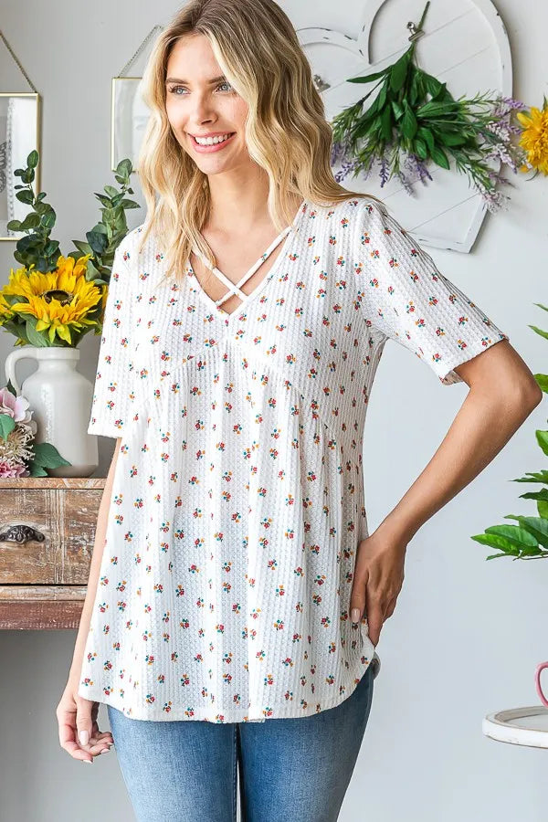 Image of Heimish Full Size Crisscross Ditsy Floral Babydoll Top Plus Size | Queeble.shop