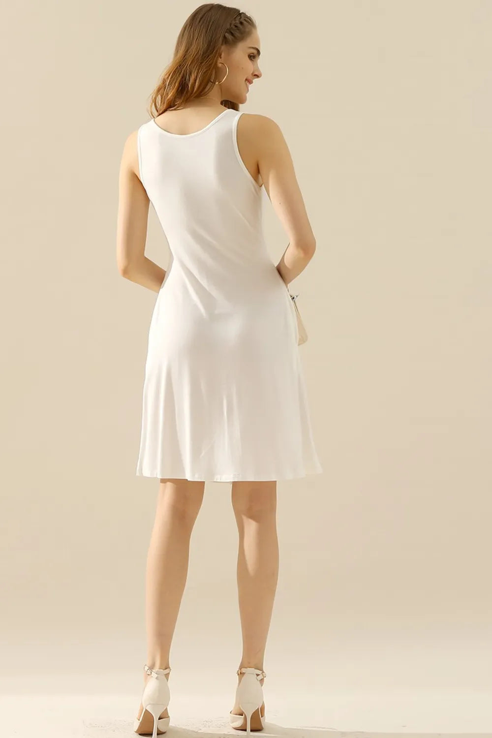 Image of Doublju Full Size Round Neck Ruched Sleeveless Dress with Pockets | Queeble.shop
