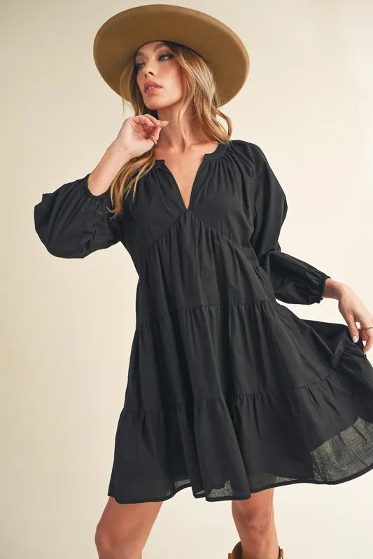 Image of Aemi + Co Notched Balloon Sleeve Tiered Mini Dress | Queeble.shop