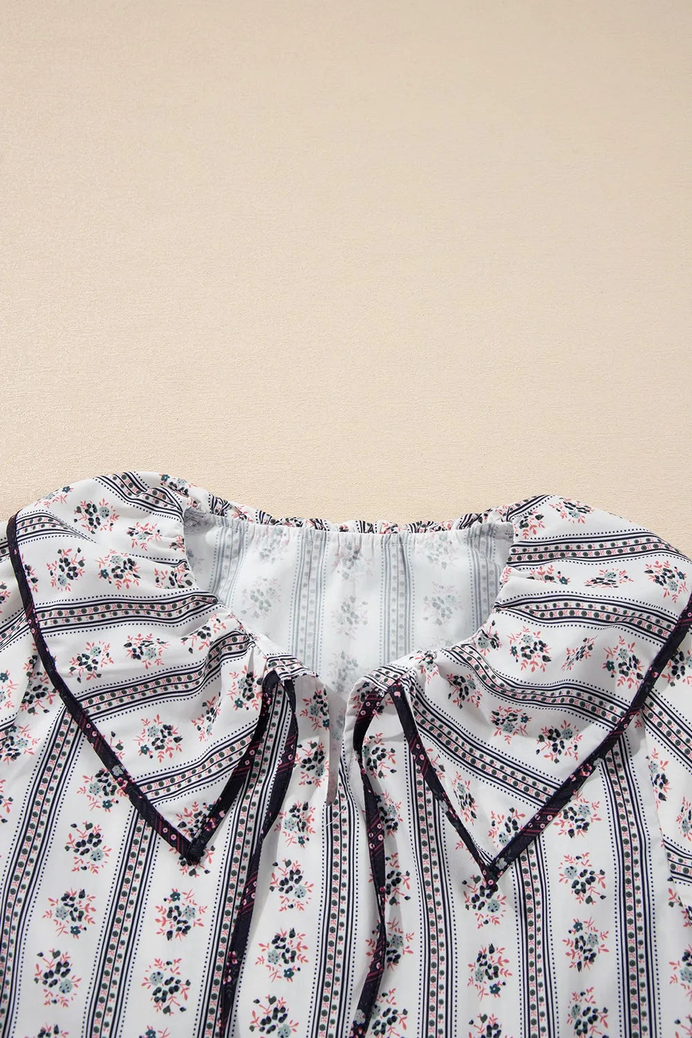 Image of Floral Ruffled Collar Short Puff Sleeve Printed Blouse | Queeble.shop