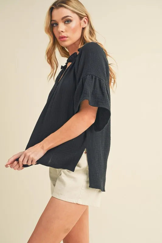 Image of Aemi + Co Side Slit Notched Ruffled Half Sleeve Blouse | Queeble.shop