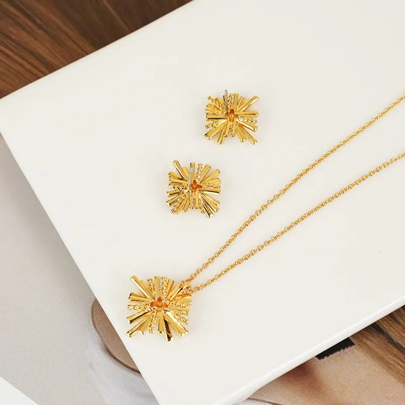 Image of Starburst Gold-Plated Earrings and Necklace Set | Queeble.shop