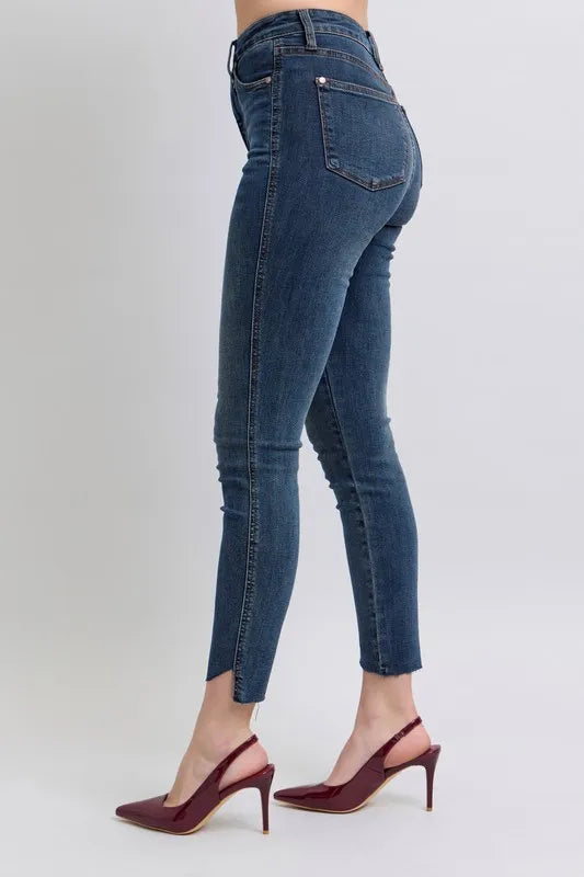 Image of Judy Blue Full Size High Waist Tummy Control Step Hem Skinny Jeans Plus Size | Queeble.shop