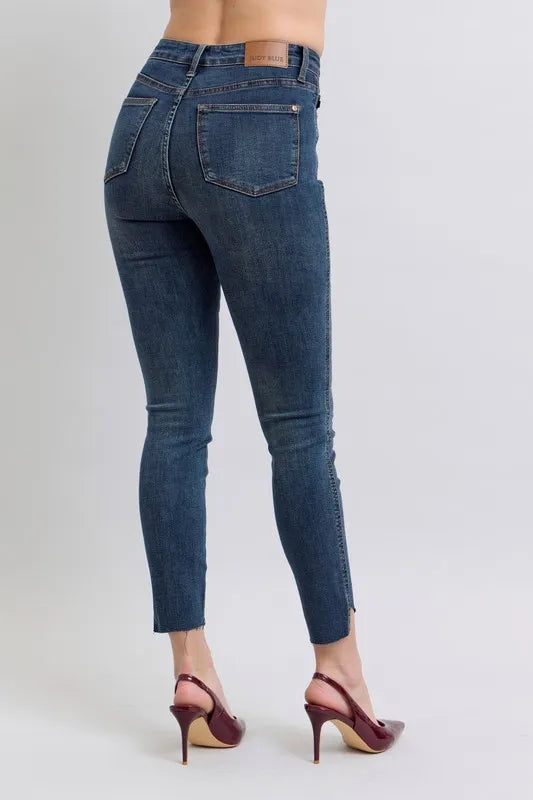 Image of Judy Blue Full Size High Waist Tummy Control Step Hem Skinny Jeans Plus Size | Queeble.shop