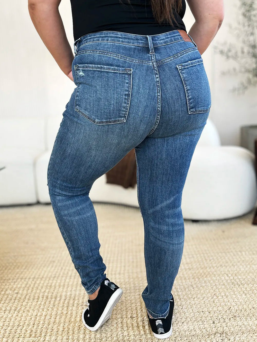 Image of Judy Blue Full Size Mid Waist Distressed Slim Jeans | Queeble.shop